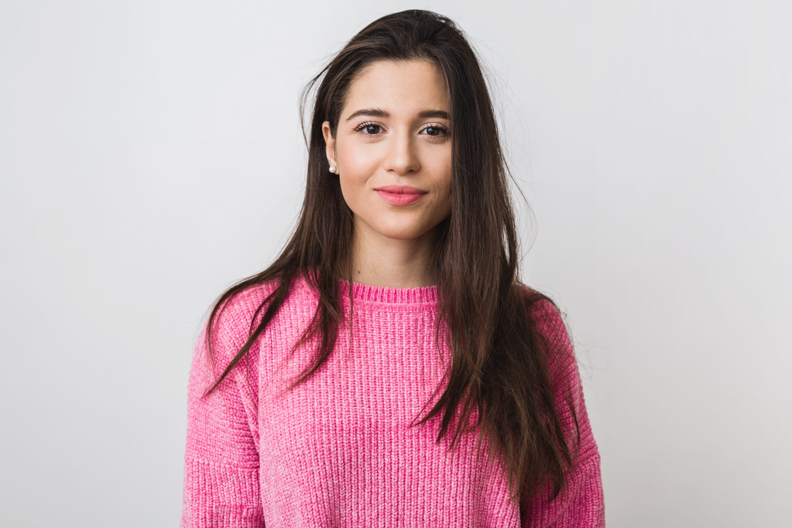 young-beautiful-woman-pink-warm-sweater-natural-look-smiling-portrait-isolated-long-hair (1)